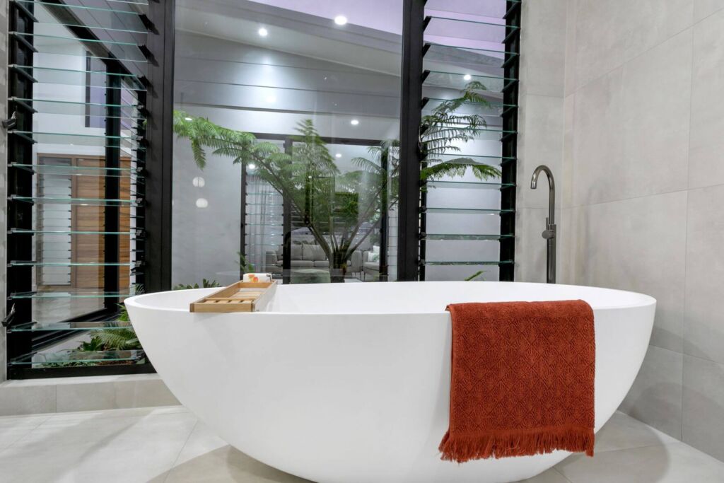 Palm Cove Display Home Bath with a Garden View